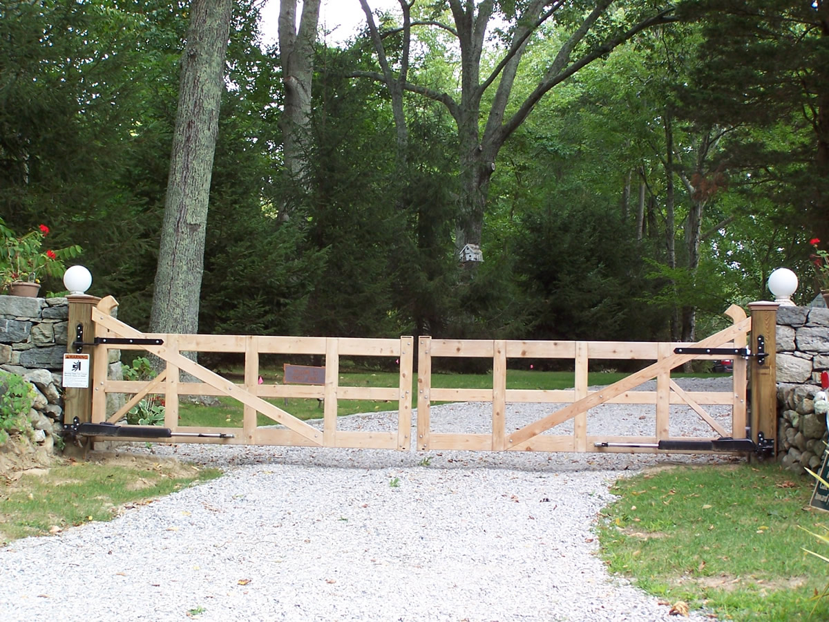 Custom double gate on a post and rail fence installed by Arrow Fence in Connecticut